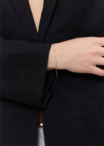 Elegant guld armbånd til mænd og kvinder i 1x1 figaro vikling med flade led 