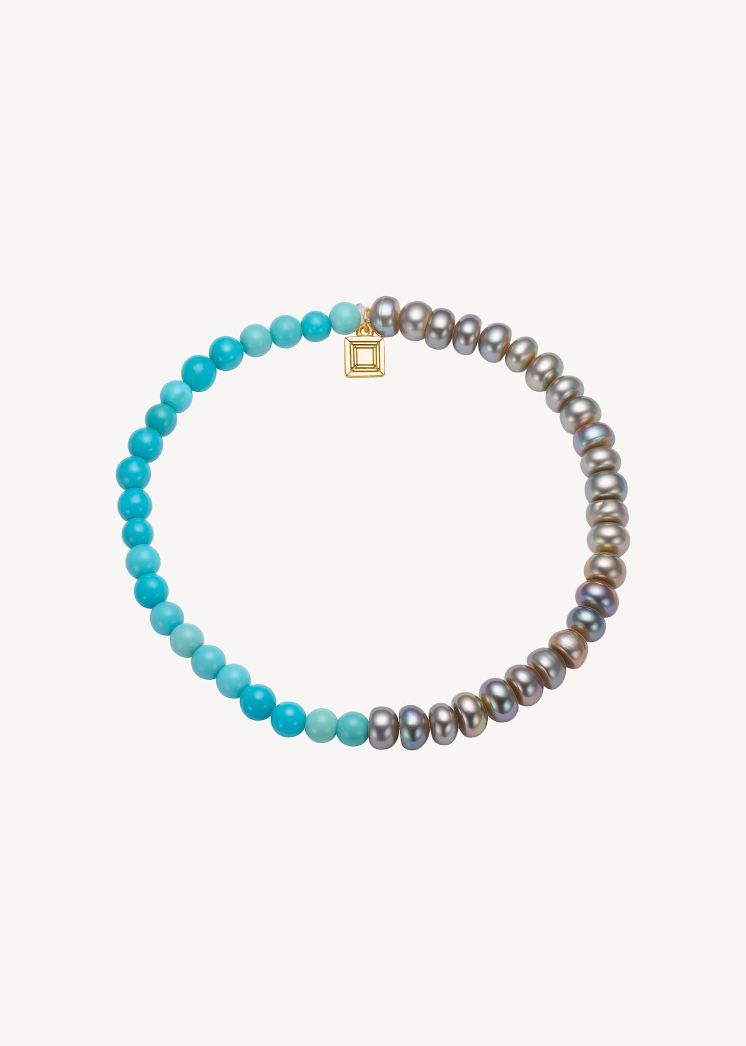 Smukt håndlavet armbånd i guldbelagt sølv med blå turkisog grå ferskvandsperler med elastik, der passer til alle arme