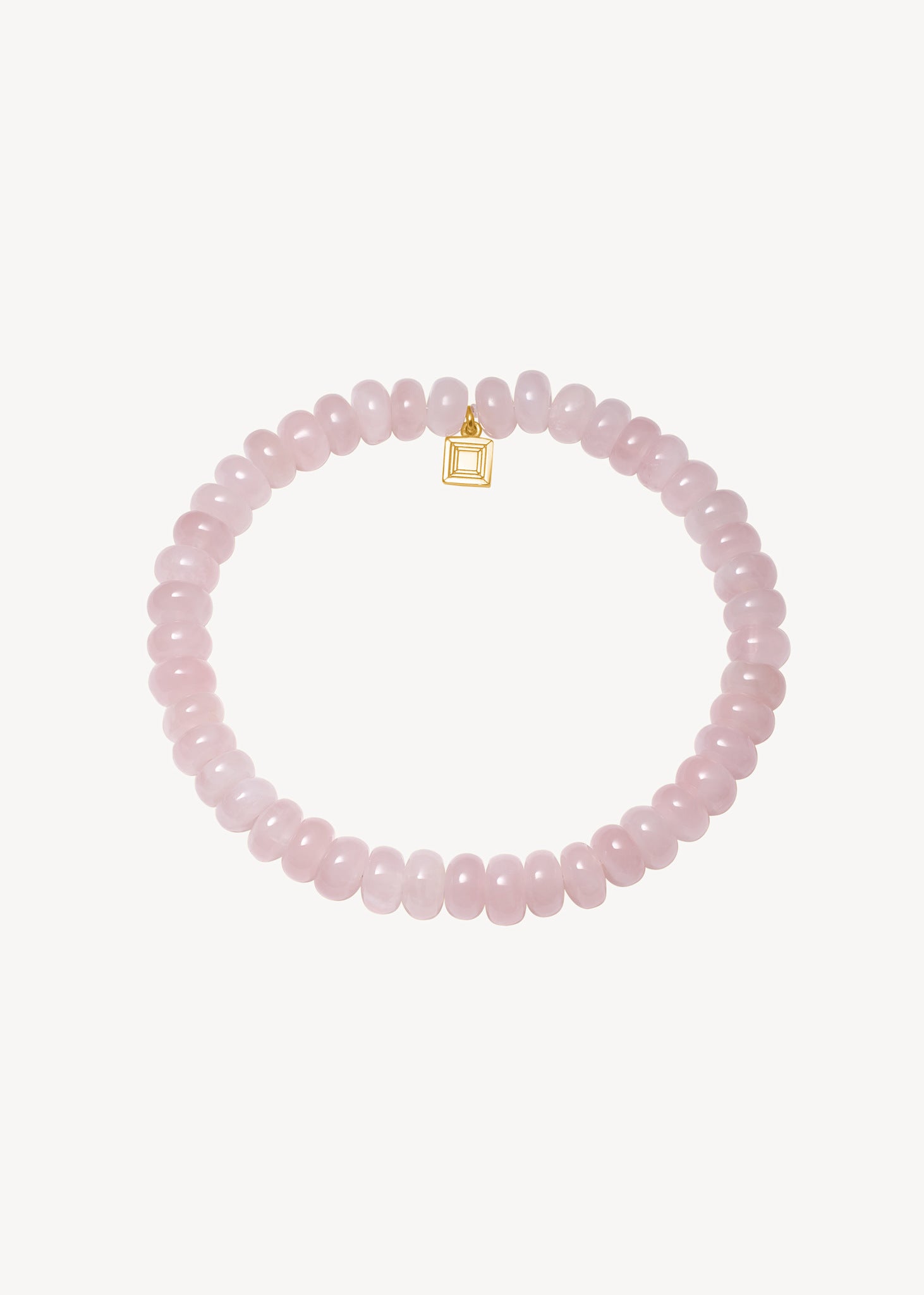 elegant slip on armbånd med rosa kvarts ædelsten, der symboliserer romantik og kærlighed, perfekt gave til hende under 600 kr