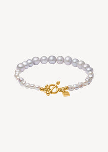 Lotus Armband mit grauen Süßwasserperlen - vergoldet