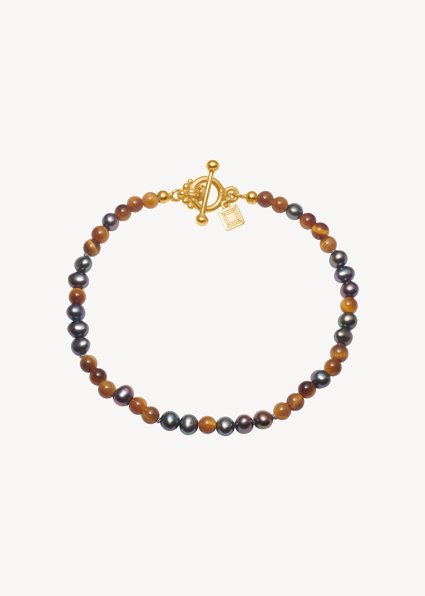 Uma Armband mit Pfauenperlen und Tigerauge - vergoldet