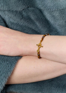 Uma Armband mit Pfauenperlen und Tigerauge - vergoldet