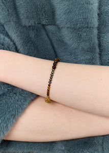 Dani Armband mit Pfauenperlen und Tigerauge - vergoldet