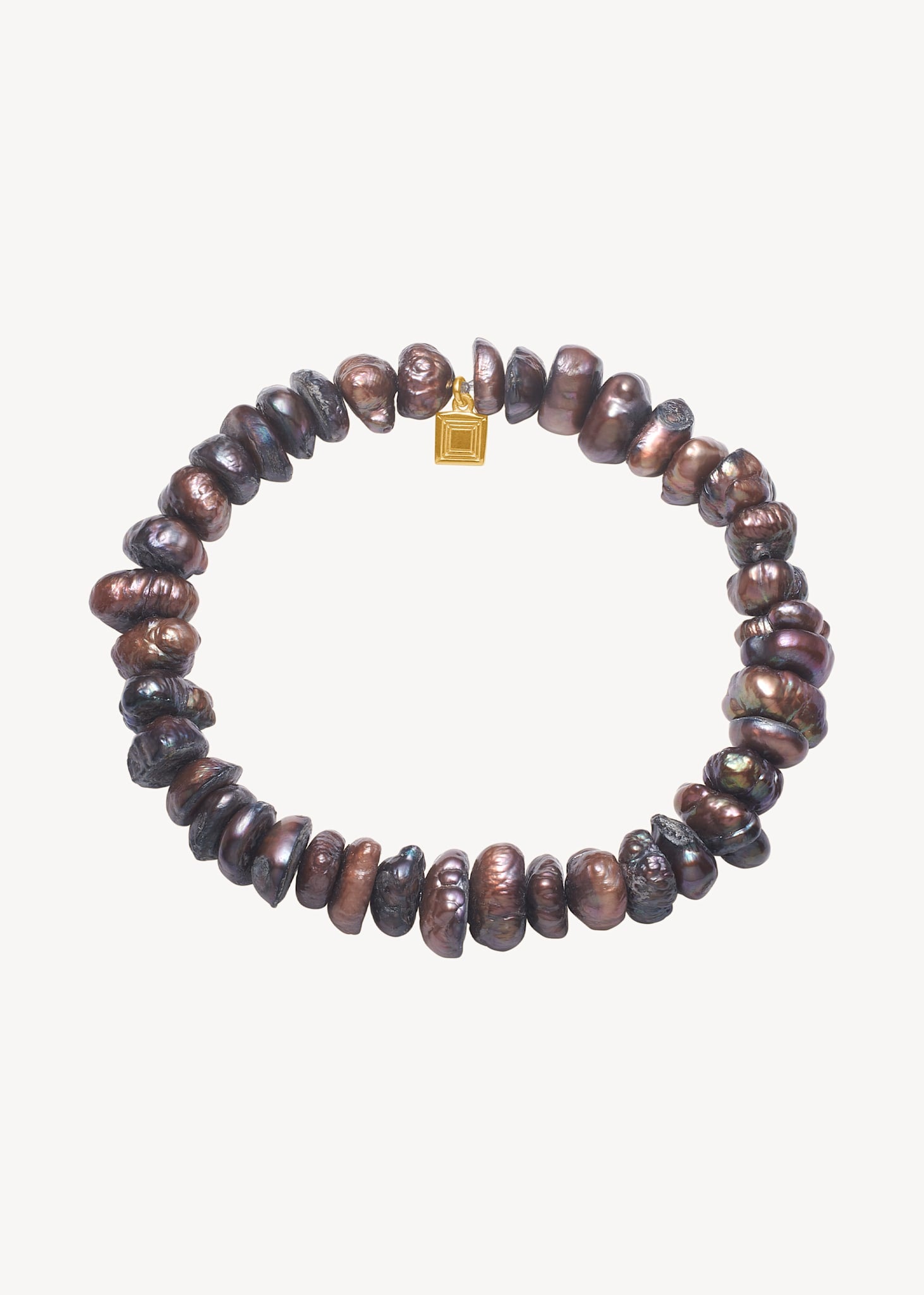 Unikt håndlavet perlearmbånd fra carré jewellery med grå, barokke påfugle perler, der har et nærmest læderagtigt udseende