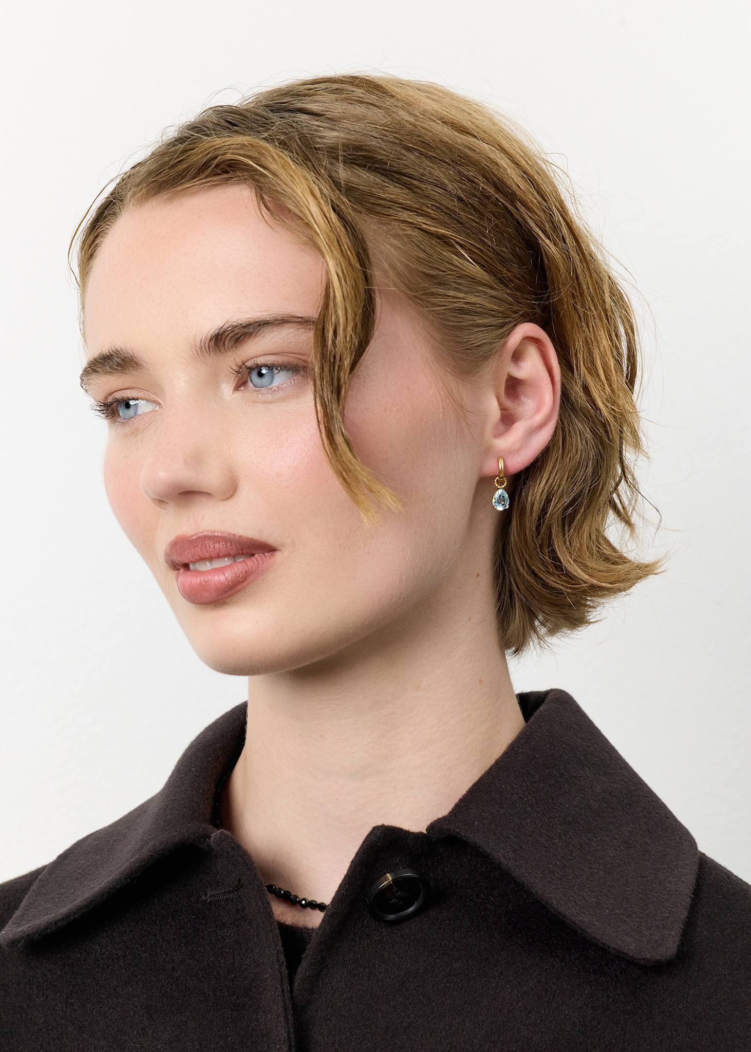Pirus charm mit blauem Topas 1 stk - vergoldet