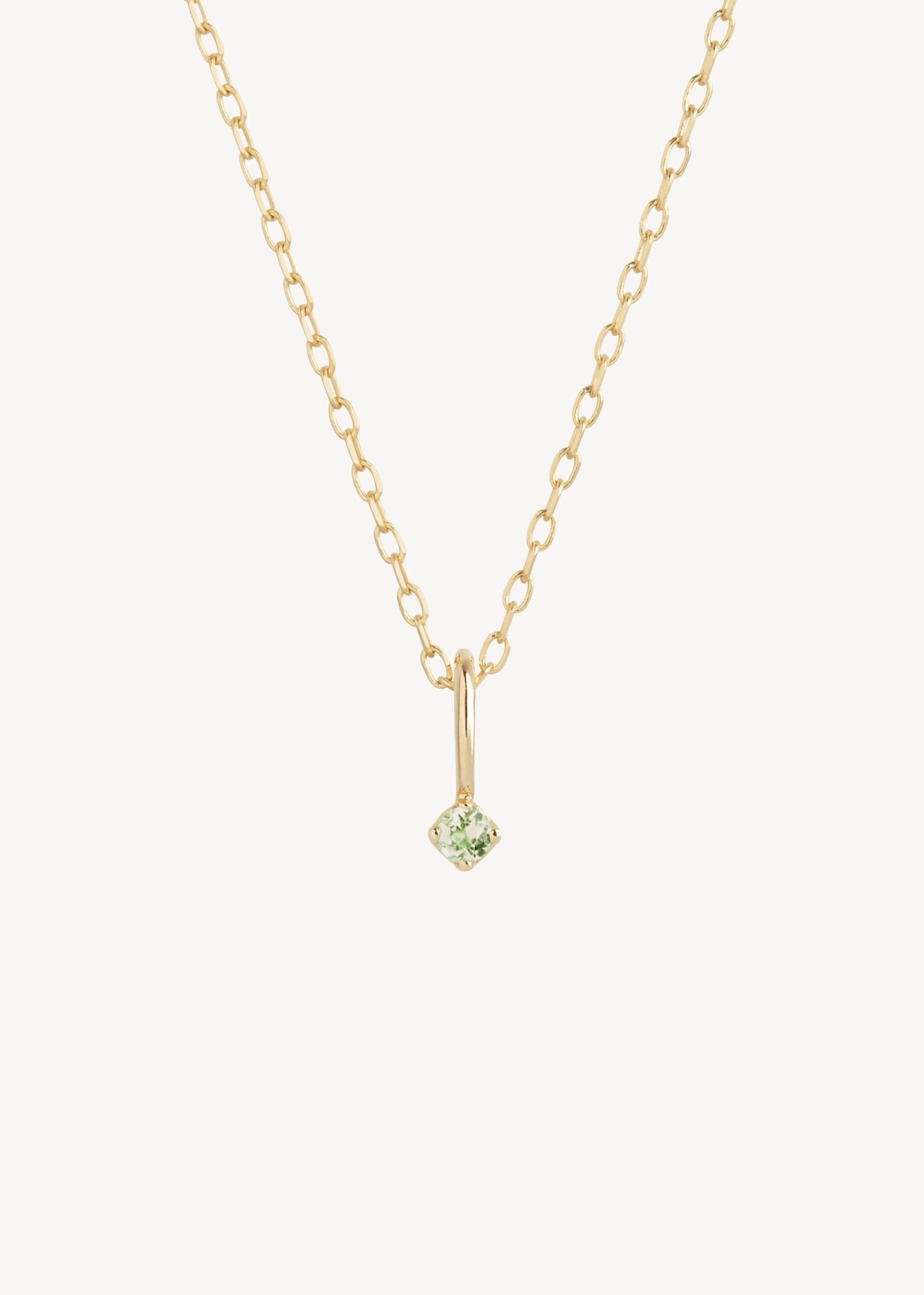 Vedhæng til halskæder i ægte 10 karat guld fra carré jewellery i enkel og sød stil med en lysegrøn turmalin ædelsten